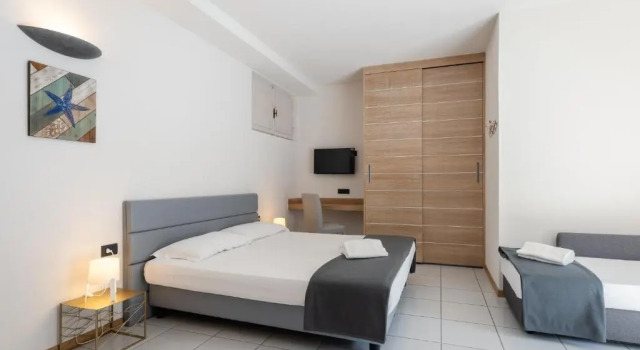 Standard Vierer Zimmer Hotel Delfino