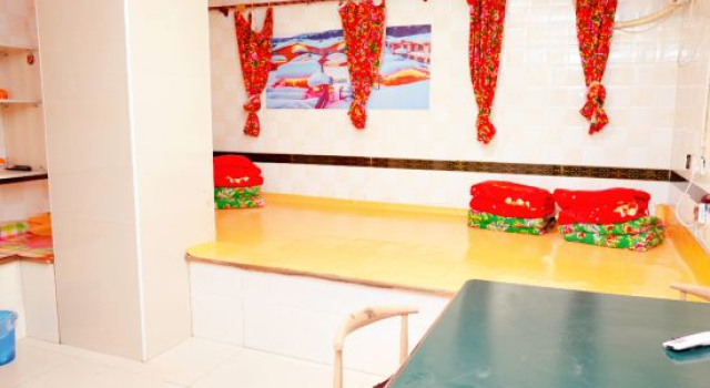 Кровать в общем номере Chaganhu Fisherman's Courtyard