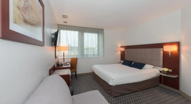 Четырёхместный номер Standard Kyriad Limoges Centre Gare - Atrium