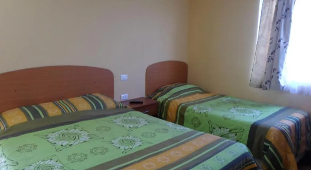 Standard Quadruple room Hostal Playa Brava