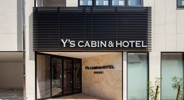 Кровать в общем номере Y's Cabin & Hotel Naha Kokusai Dori