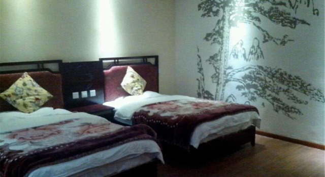 Emeishan Xinyaju Hotel, Prenota Hotel Monte Emei Sichuan