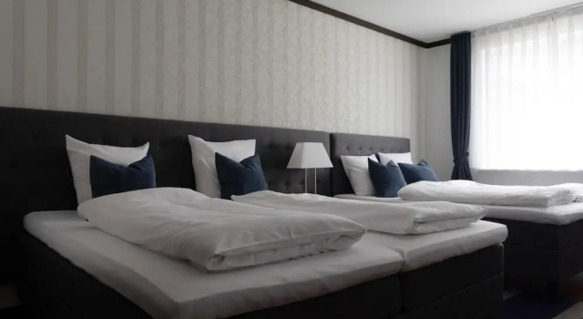 Четырёхместный семейный номер Standard Helnan Phønix Hotel