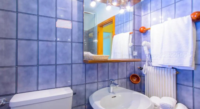 Четырёхместный номер Comfort Park Hotel Faloria