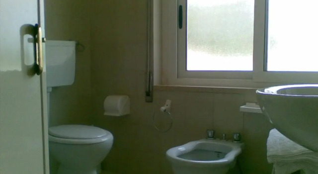 Четырёхместный номер Standard Hotel Autostello Grotte