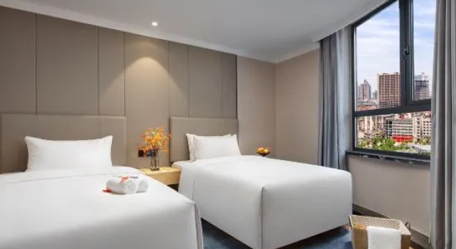Kényelem családi lakosztály a városra néző kilátással Wandai Hotel