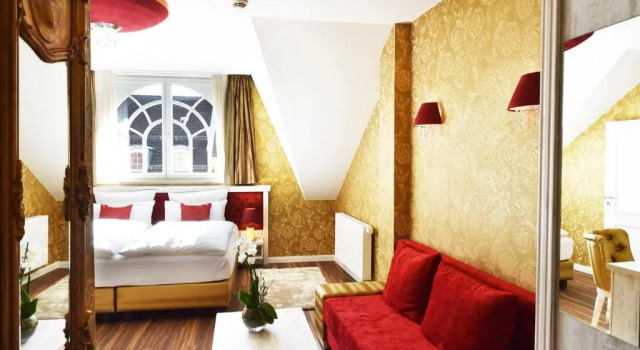 Люкс MOMENTS Boutique Hotel