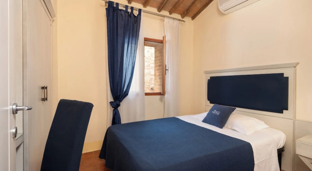 Четырёхместный семейный номер Standard Hotel Ristorante Borgo Antico