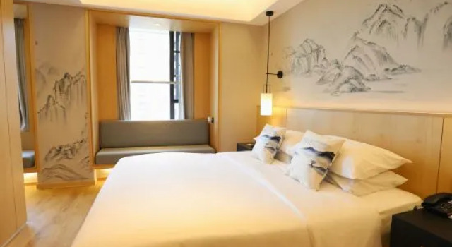 Люкс Minshan Hotel (Mianzhu Tianyue Store)