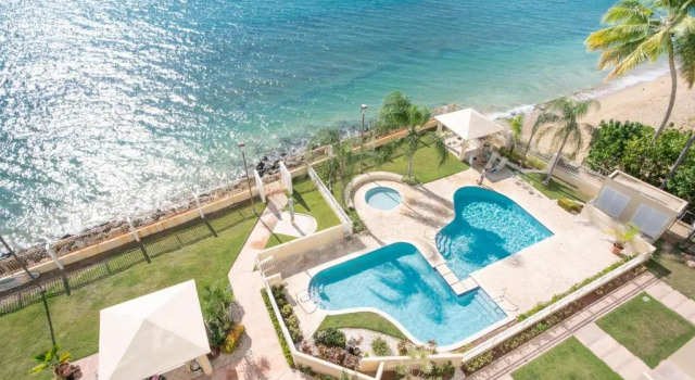 Апартаменты Beachfront Penthouse with Ocean and Sunset Views at Pelican Reef #703