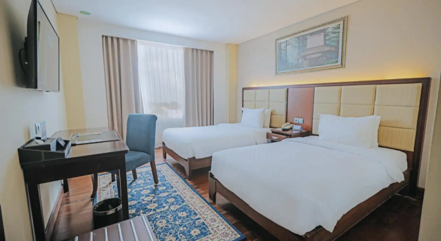Номер Deluxe Grand Qin Hotel Banjarbaru Syariah