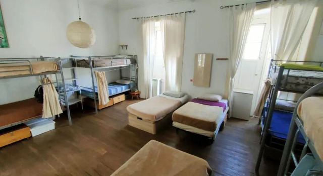 Кровать в общем номере Hostel Albergue La Casa Encantada