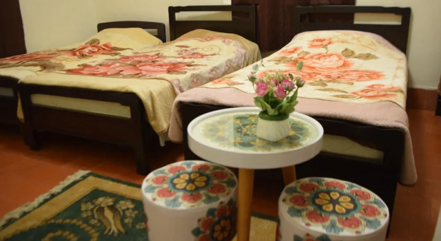 Кровать в общем номере City Guest House