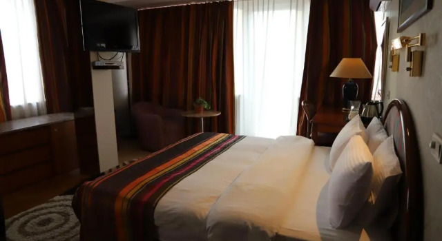 Hotel Super 8, Забронировать Отель Отели Скопья 3 звезды, рядом с Saints Cyril and Methodius University of Skopje, 3*