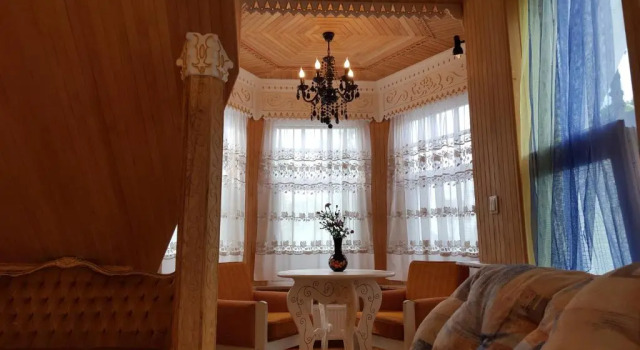 Апартаменты Deluxe Naiza Guesthouse and Apartments