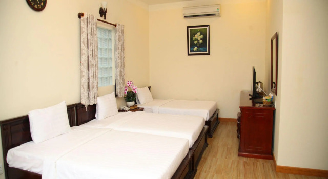 Трёхместный семейный номер Standard Minh Tam Hotel and Spa