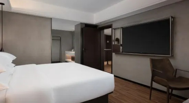 Люкс Business enjoy inn Wanning Hotel