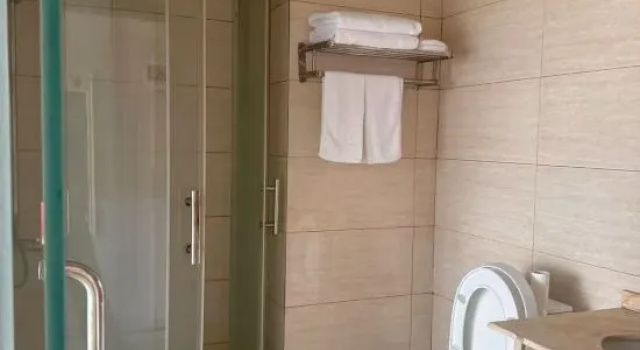 Люкс Deluxe Fuyang Shangle Hotel(International Auto Parts City Store)