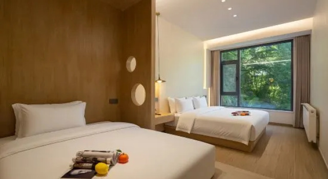 Кровать в общем номере Anji Little Forest - Qi Xi Hotel