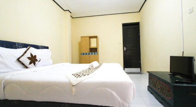 Clamonic Guest House, Boek Pension Benoa Bali