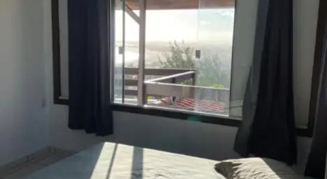 Casa com vista para o mar! Farol de Santa Marta, Забронировать Отель Фарол-де-Санта-Марта Санта-Катарина