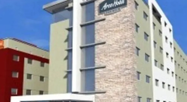 Кровать в общем номере Hotel Cassino Tower Piracicaba by Nacional Inn