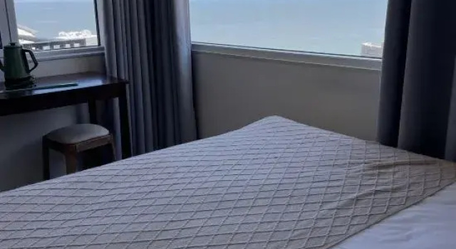 Люкс с 2 комнатами с красивым видом из окна Lianyungang One Step Away Seaview Homestay