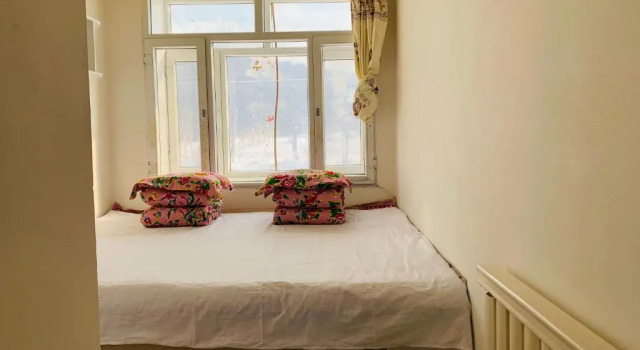 Xiaoguo Travellers' Home, Buchen Sie Hotel Wuchang Heilongjiang