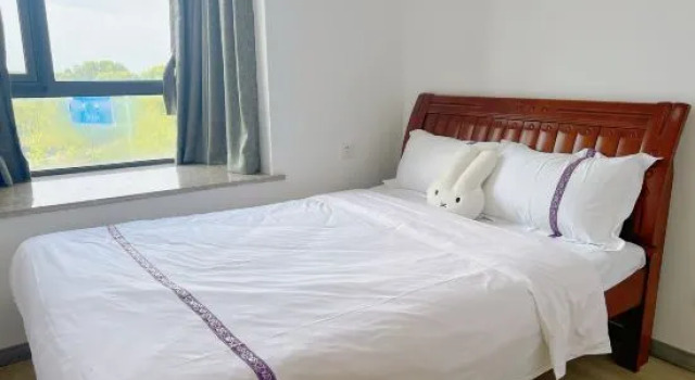Трёхместный люкс с 3 комнатами Haoke Travel  Hotel