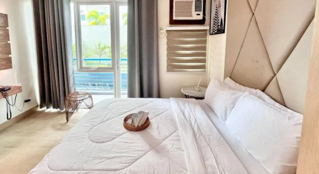 Relaxing Stay at One Madison Tower, Забронировать Апартаменты/квартира Апартаменты Илоило, рядом с Бизнес-парк Илоило, Апартаменты/квартира