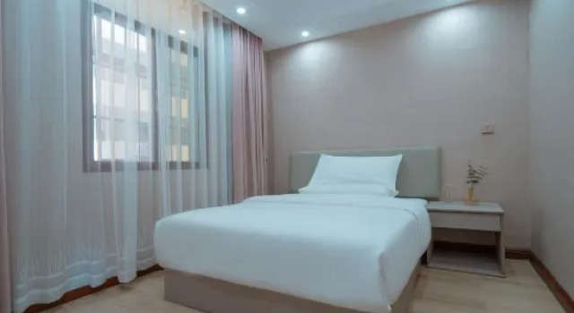 Двухместный семейный люкс Weiyuna Hotel (XiShuangBanNaMenghai)