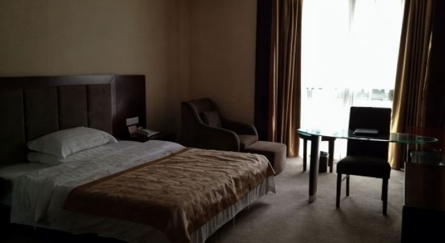 Люкс Deluxe c 1 комнатой Qingliu Jiuzhou Business Hotel