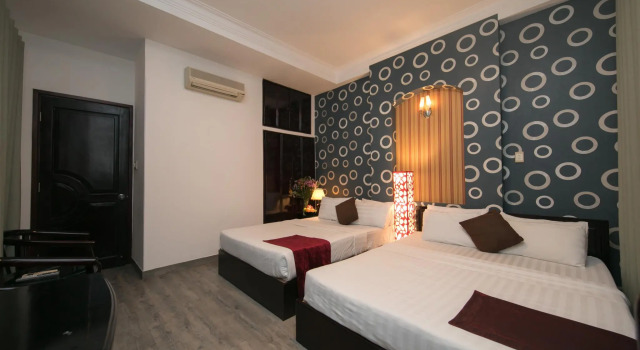 Трёхместный номер Deluxe с видом на город Anh Duy Hotel - Nguyễn Công Trứ The Bitexco Neighbour