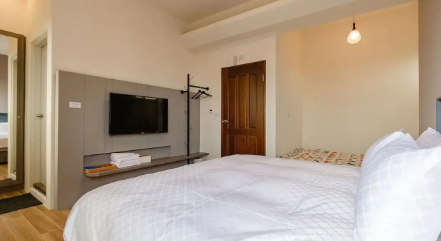 Трёхместный семейный номер Standard с балконом Xiao Tian Di Homestay