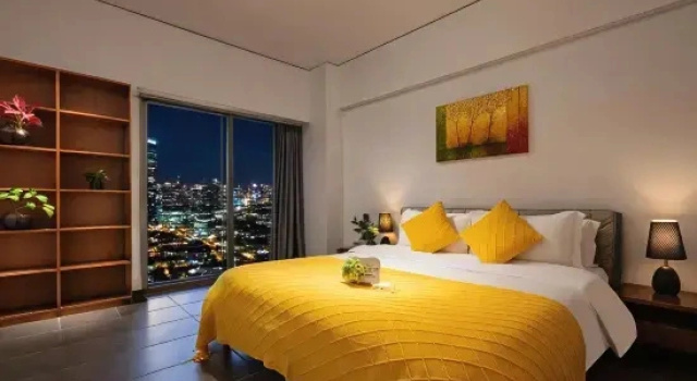 Четырёхместный семейный люкс Deluxe с балконом Shenlan Urban Hotel Apartment (Wanlvyuan Friendship Sunshine City Branch)