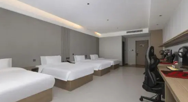 Кровать в общем номере Manpo E-sports Business Hotel