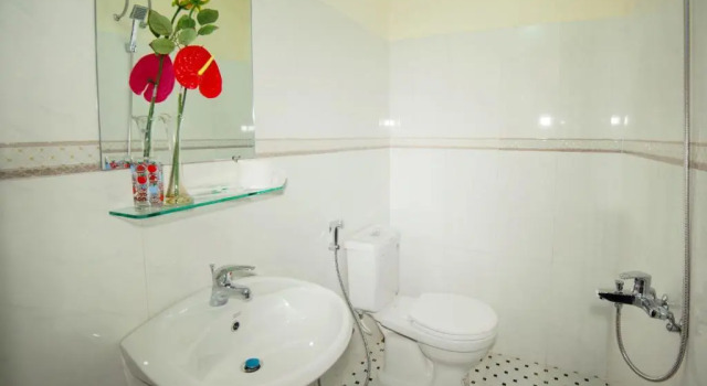 Кровать в общем номере Royal Homestay