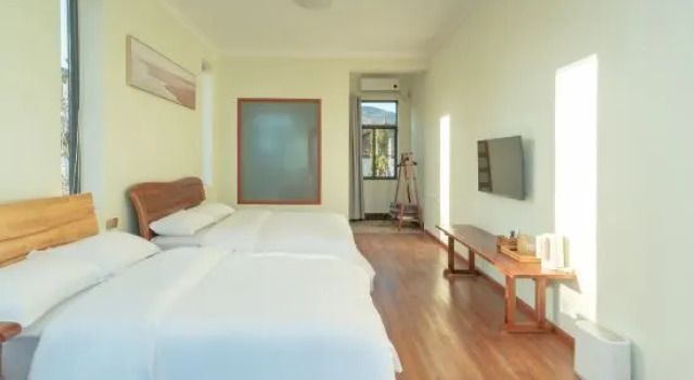 Семейный люкс Shuiyuejinghua Homestay (Lijiang Sanyi International Airport)