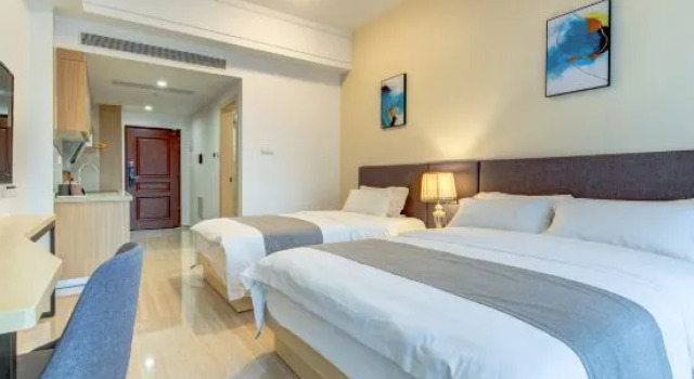 Кровать в общем номере Hengqin Peninsula Holiday Hotel (Chimelong Ocean Kingdom, Zhuhai)