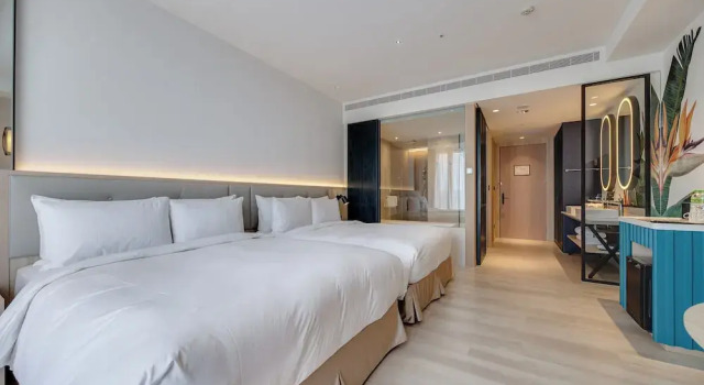 Четырёхместный номер Deluxe Boutech Wuri Village Hotel