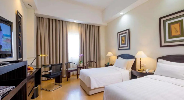 Номер Deluxe Sintesa Peninsula Hotel Palembang