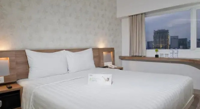 Двухместный номер Standard c 1 комнатой Whiz Hotel Cikini Jakarta
