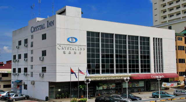 Кровать в общем номере Crystal Inn