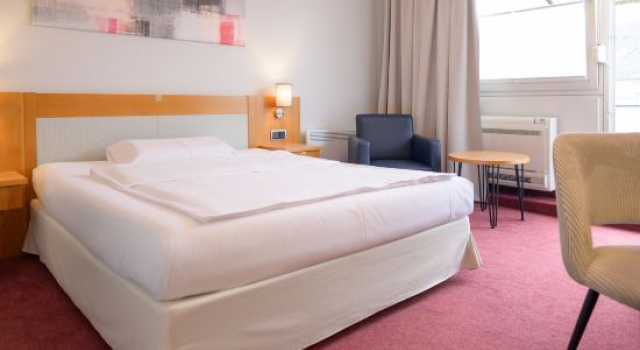 Conforto quarto Hotel Schiller