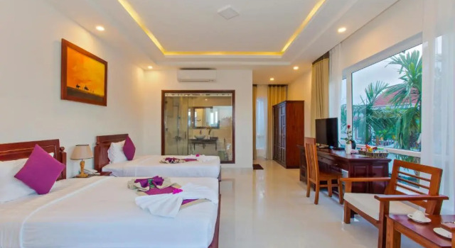 Трёхместный номер Standard с балконом Hoi An Palmy Villa