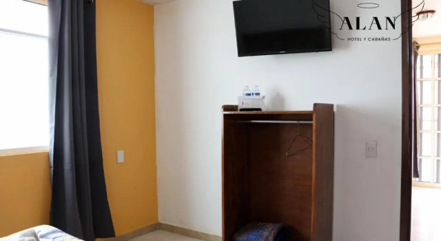 Четырёхместный номер Standard с красивым видом из окна Hotel y Cabañas Alan