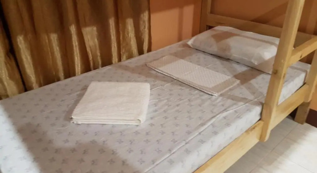 Кровать в общем номере Stellaz guesthouse