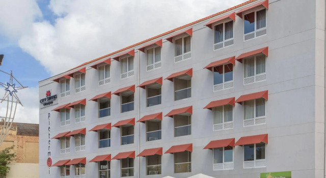 Отель Majestic City Suites & Beach
