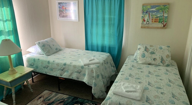Queen Anne's Revenge At The Beach 3 Bedroom Cottage by RedAwning