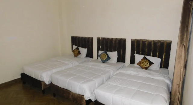 Standardowy trzyosobowy pokój Empire Hotel